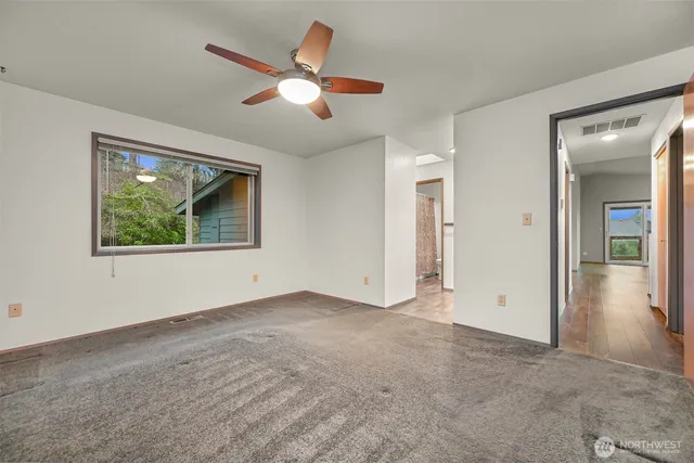 an empty room that has a window