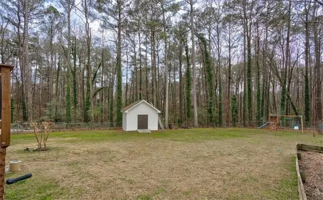 $2,495 | 1201 Holly Hills Drive Southwest, Lilburn, GA 30047