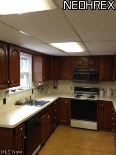 25125 Highland Road Cleveland, OH 44143 - Photo 11 of 12 Very clean kitchen with nice cabinetry