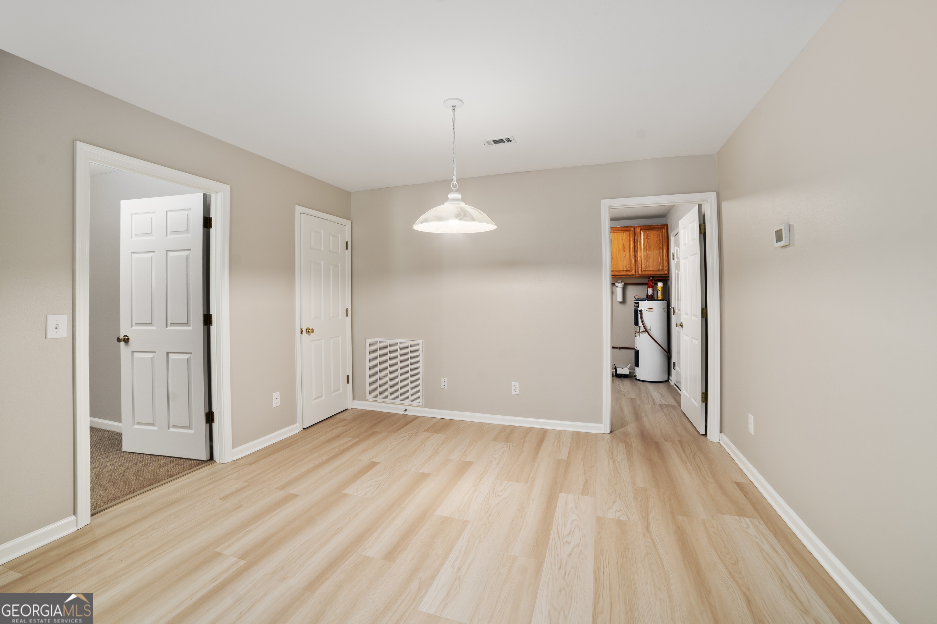 2116 Dot Harvey Road Jakin, GA 39861 - Photo 6 of 36 Breakfast area / dining area with half bath off to the side