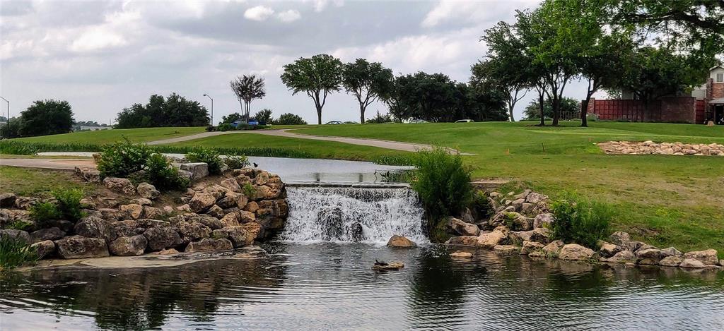4428 Bent Path Round Rock, TX 78665 - Photo 17 of 17 a view of a lake with a big yard