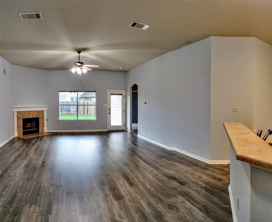 4428 Bent Path Round Rock, TX 78665 - Photo 7 of 17 wooden floor in an empty room with a window
