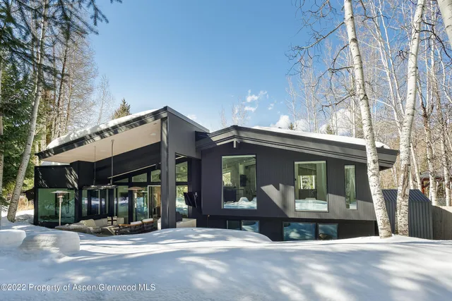 a front view of a house with a outdoor space