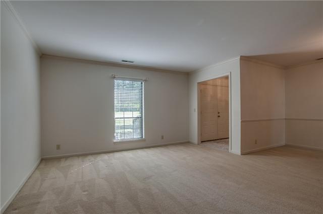 LIGHT FILLED LIVING ROOM W/ PLENTY OF SPACE