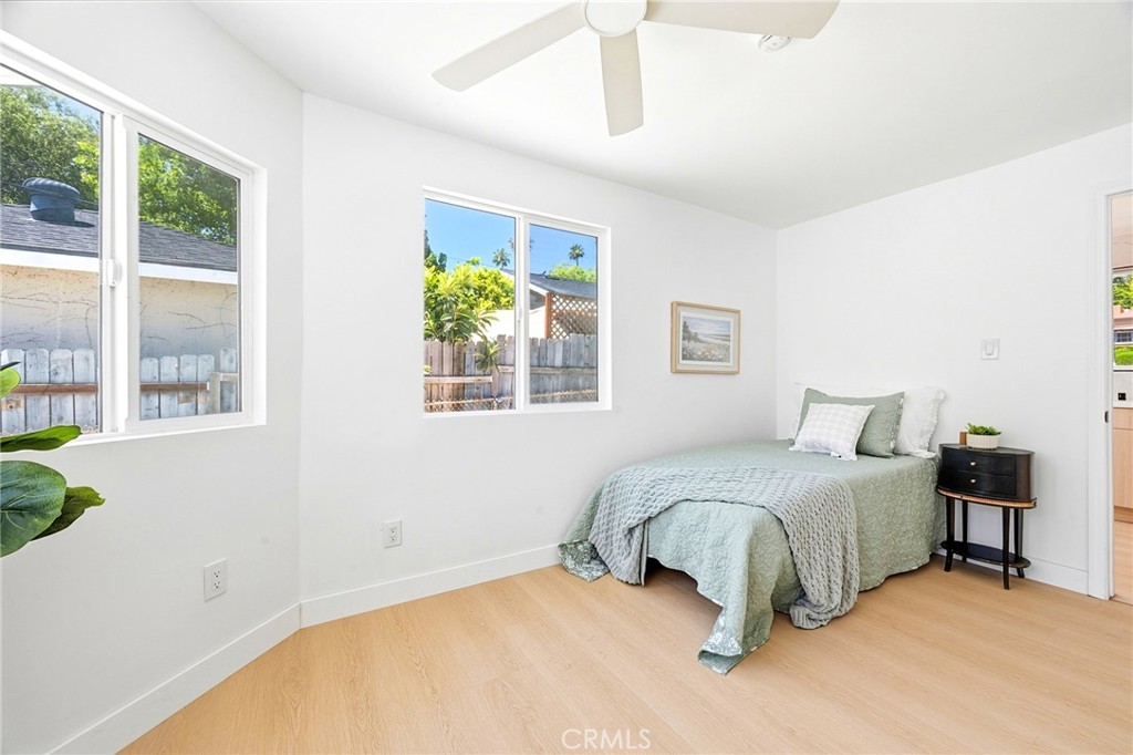 1280 East Woodbury Road Pasadena, CA 91104 - Photo 34 of 40 a bedroom with a bed and a window