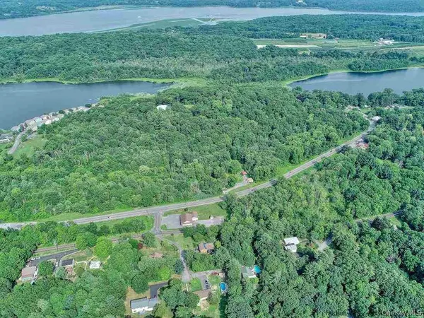 a view of a lake with a city