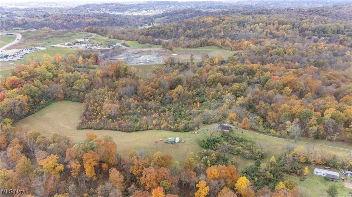 861 Roth Road Parkersburg, WV 26104 - Photo 7 of 20 Aerial view of property's location with a heavily wooded area