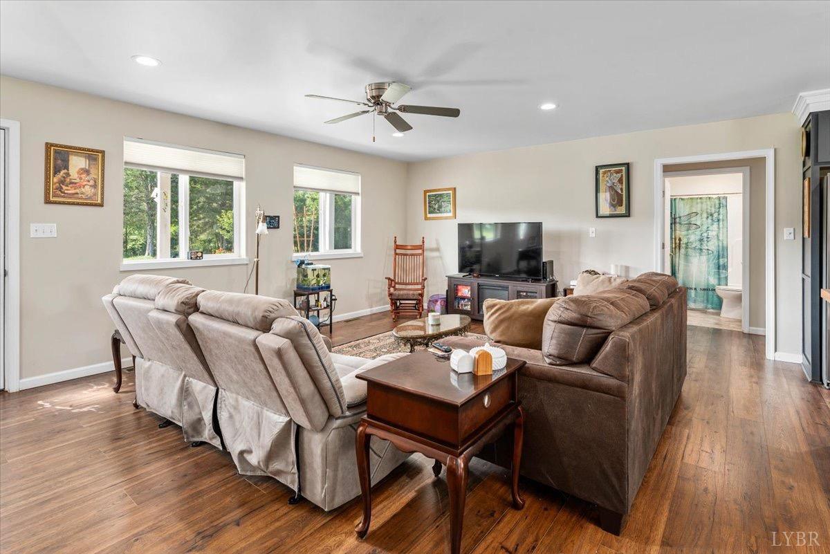 854 Kenmore Road Amherst, VA 24521 - Photo 13 of 37 a living room with fireplace furniture and a flat screen tv