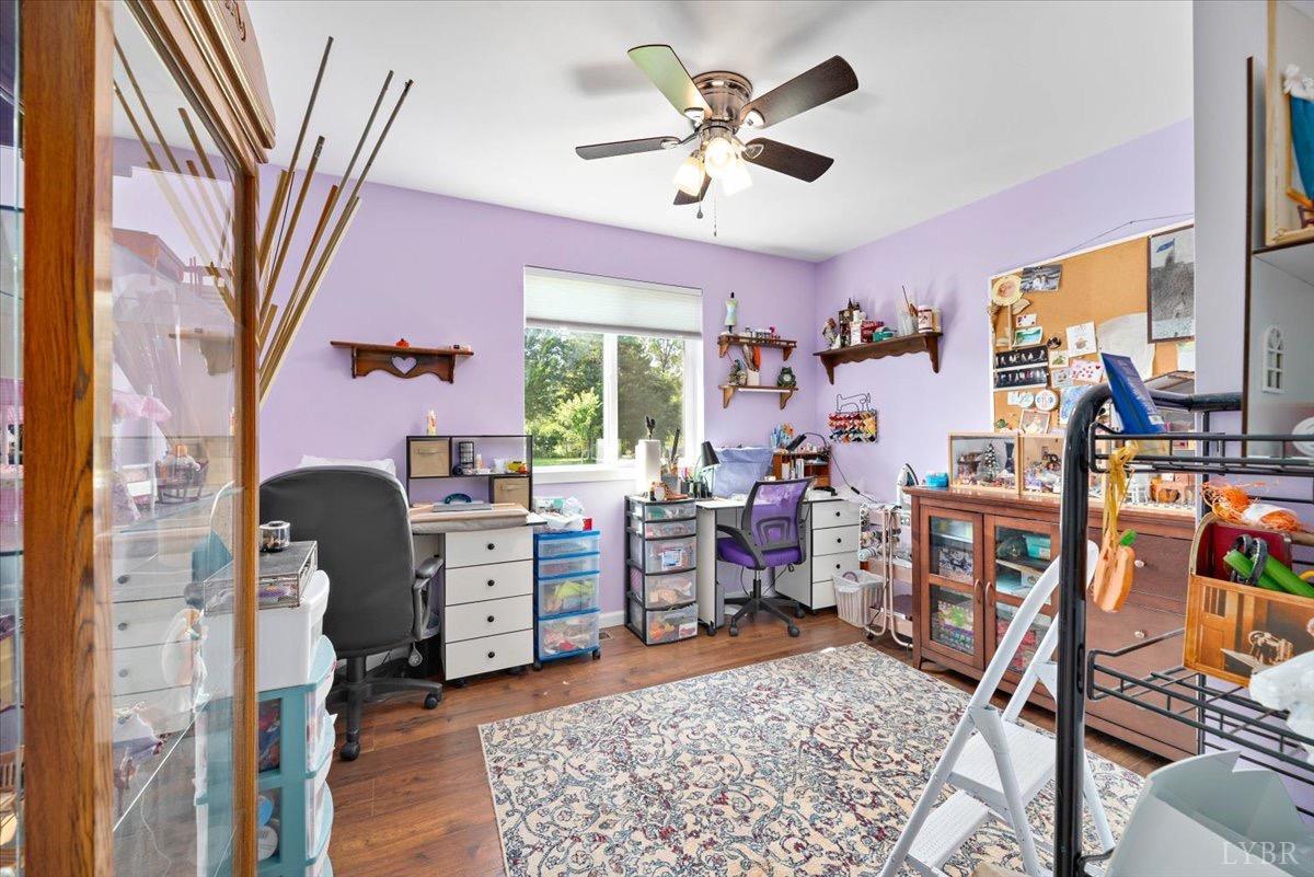 854 Kenmore Road Amherst, VA 24521 - Photo 22 of 37 a view of a workspace with furniture and a window