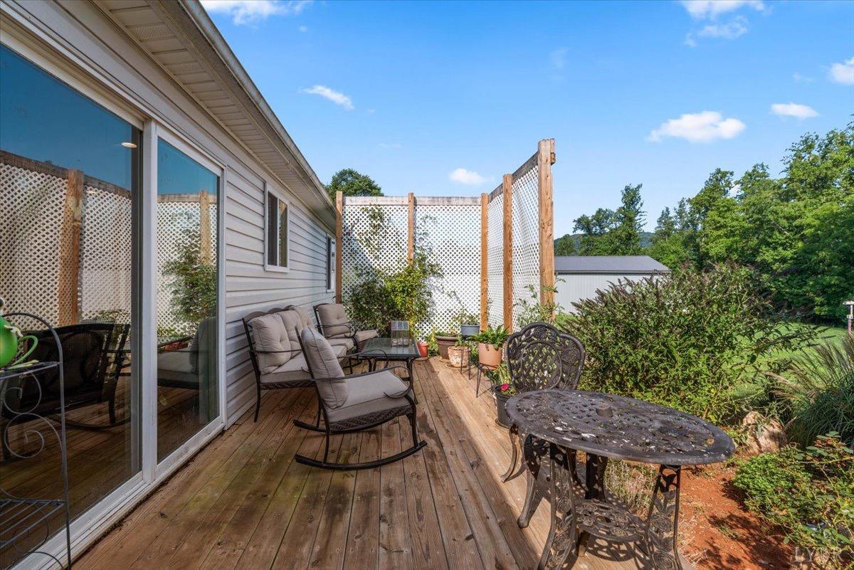854 Kenmore Road Amherst, VA 24521 - Photo 34 of 37 a view of a house with backyard and sitting area