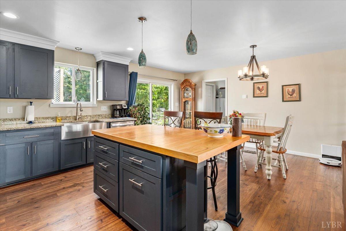 854 Kenmore Road Amherst, VA 24521 - Photo 10 of 37 a kitchen with a sink a counter space appliances and cabinets