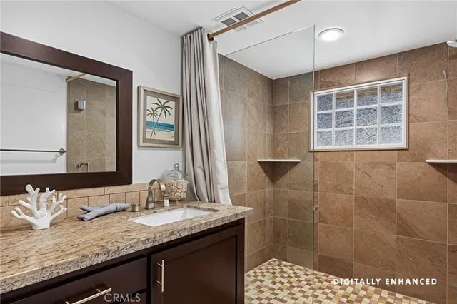 a bedroom with a large bed and a large window with garden view