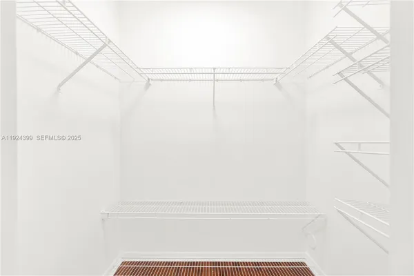 a view of small space with racks on the wall