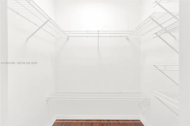 a view of small space with racks on the wall