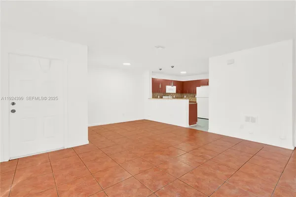 a view of a kitchen with a sink