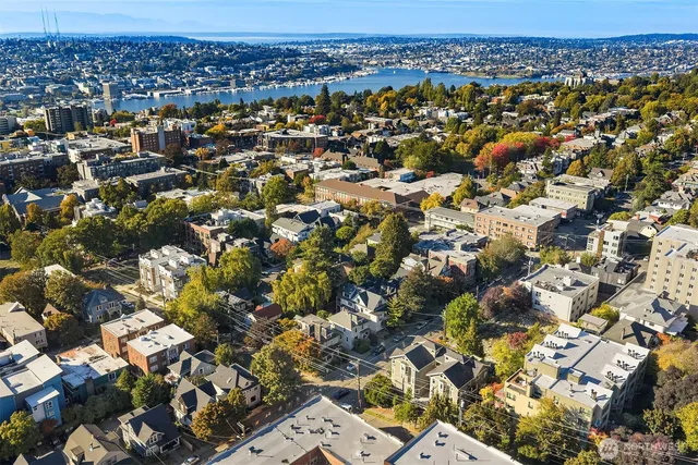 an aerial view of residential building with parking space