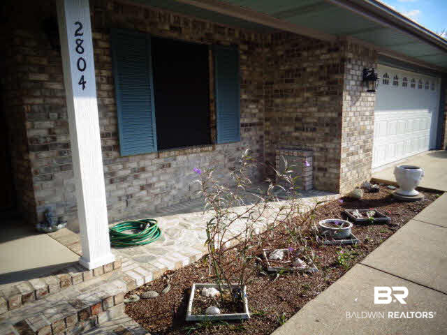 2804 Pine Ridge Drive Lillian, AL 36549 - Photo 4 of 39 18 x 05 stone and brick front porch.