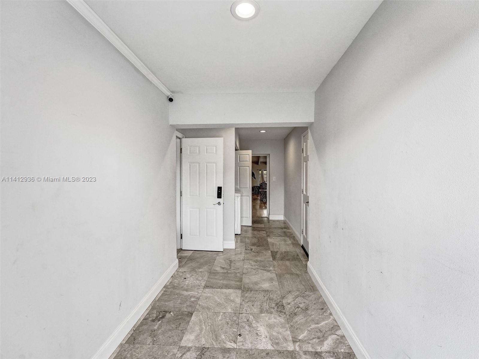 2500 Northeast 19th Street Pompano Beach, FL 33062 - Photo 22 of 51 a bathroom with a sink and a mirror