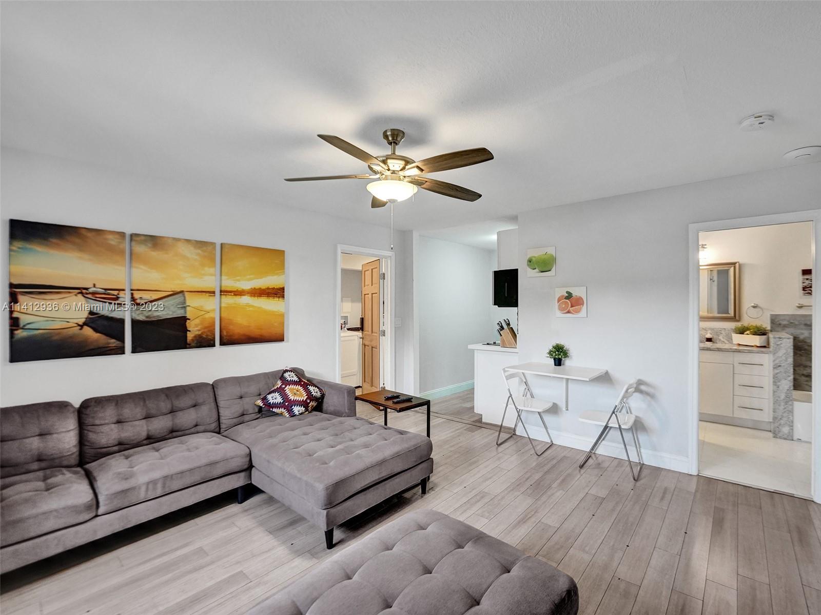 2500 Northeast 19th Street Pompano Beach, FL 33062 - Photo 31 of 51 a living room with furniture
