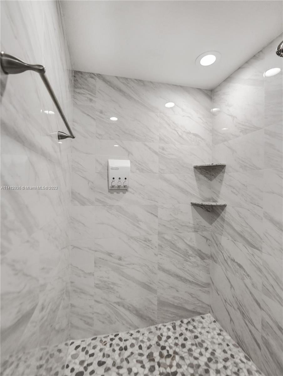 2500 Northeast 19th Street Pompano Beach, FL 33062 - Photo 47 of 51 a bathroom with a shower