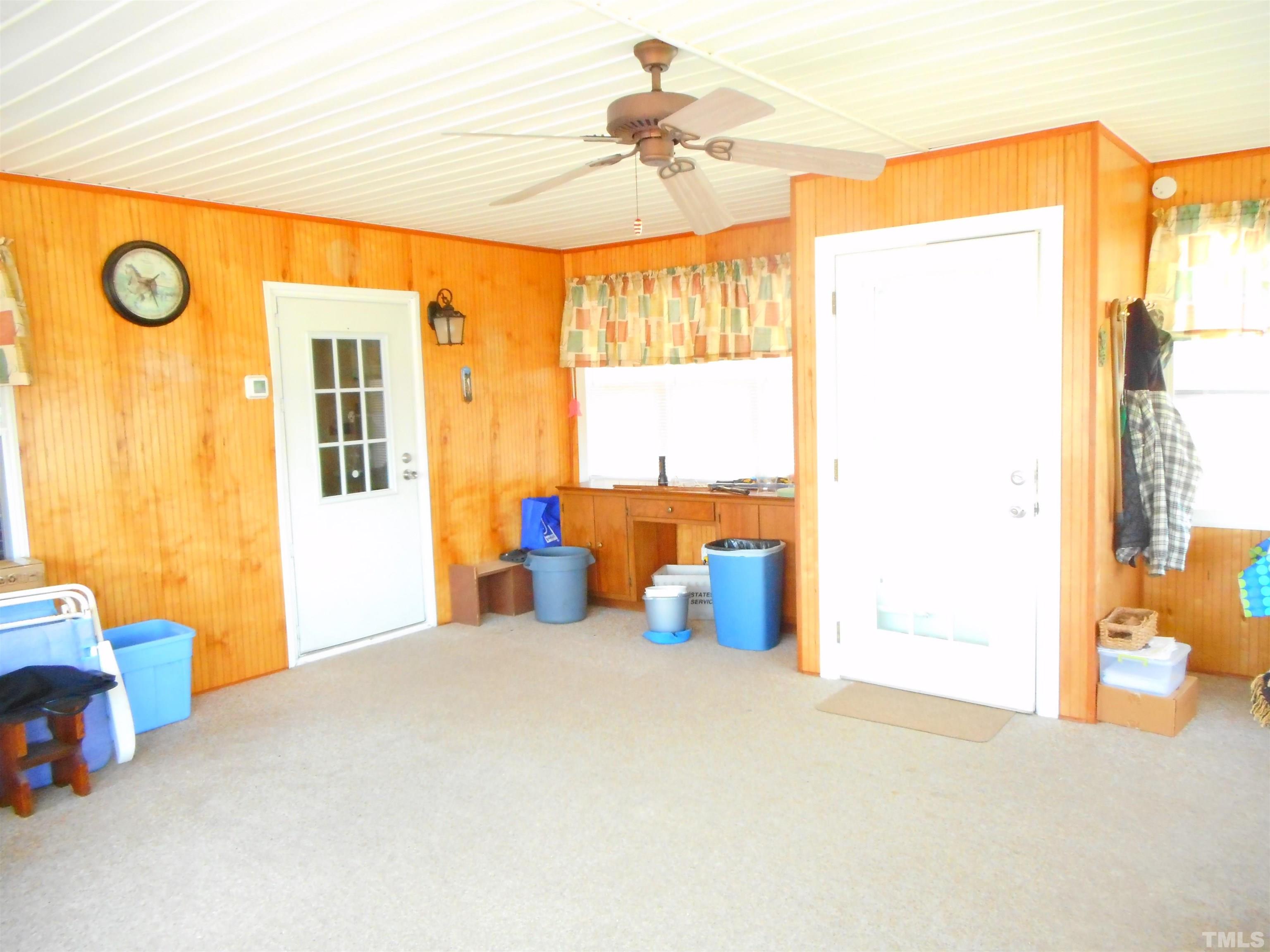 8605 Ransom Lane Kenly, NC 27542 - Photo 24 of 38 a bed room with a bed and a table