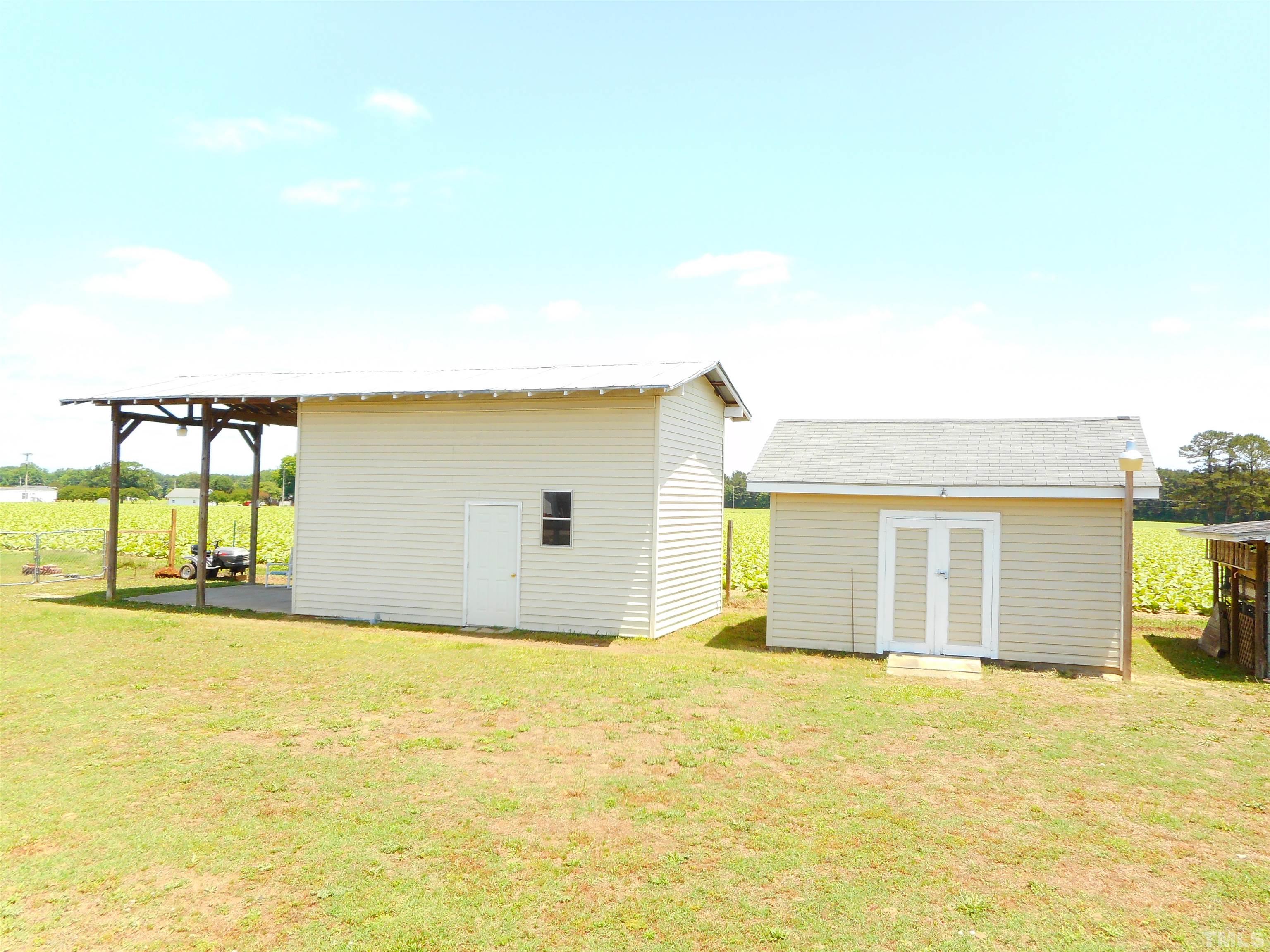 8605 Ransom Lane Kenly, NC 27542 - Photo 29 of 38 a view of a house with a swimming pool
