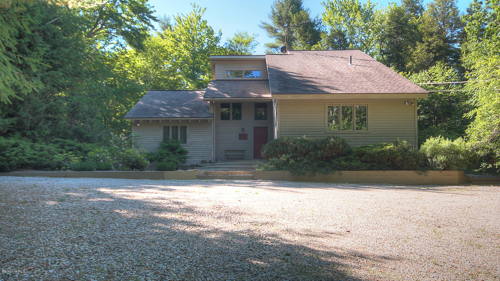 33 Sioux Road Becket, MA 01223 - Photo 2 of 33 a view of a house with a yard