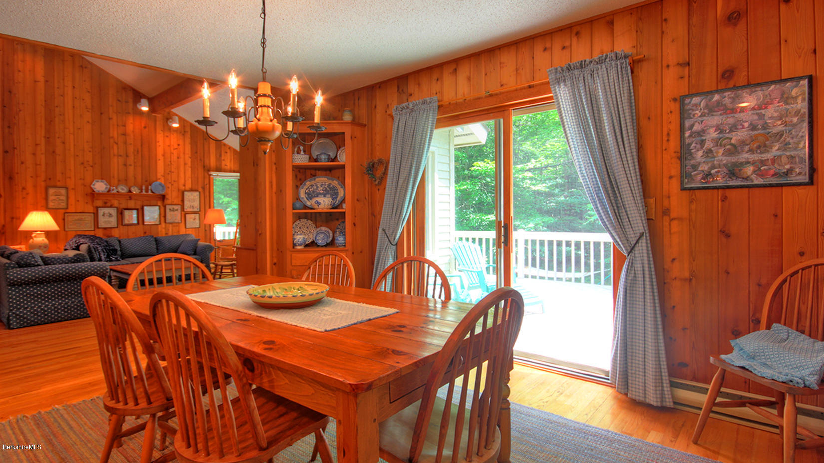33 Sioux Road Becket, MA 01223 - Photo 14 of 33 a view of a dining room with furniture window and wooden floor