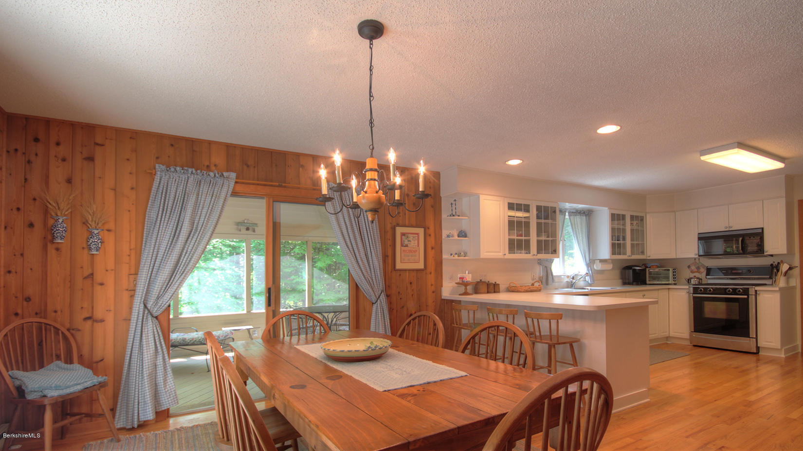 33 Sioux Road Becket, MA 01223 - Photo 15 of 33 a view of a dining room with furniture window and outside view