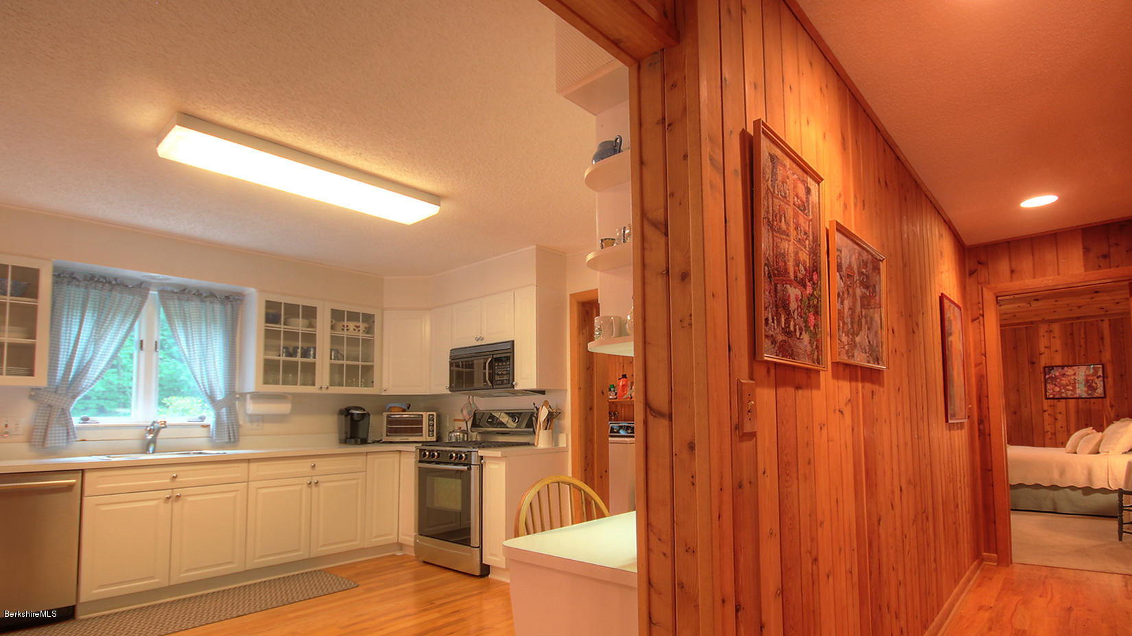 33 Sioux Road Becket, MA 01223 - Photo 16 of 33 a kitchen with stainless steel appliances granite countertop a refrigerator and cabinets