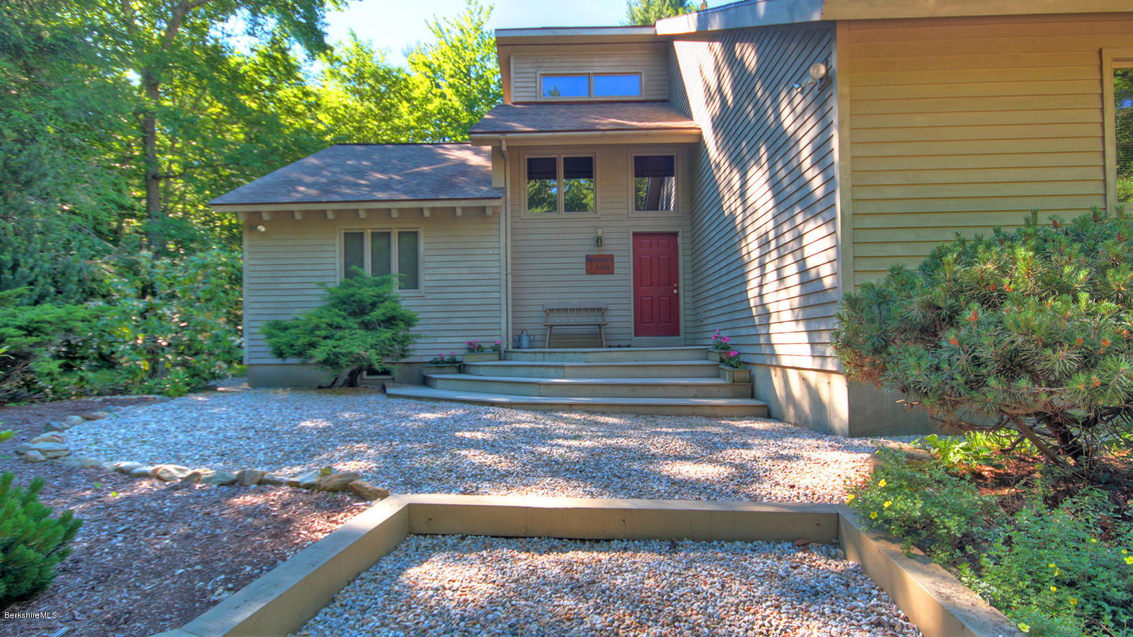 33 Sioux Road Becket, MA 01223 - Photo 3 of 33 a front view of a house with garden