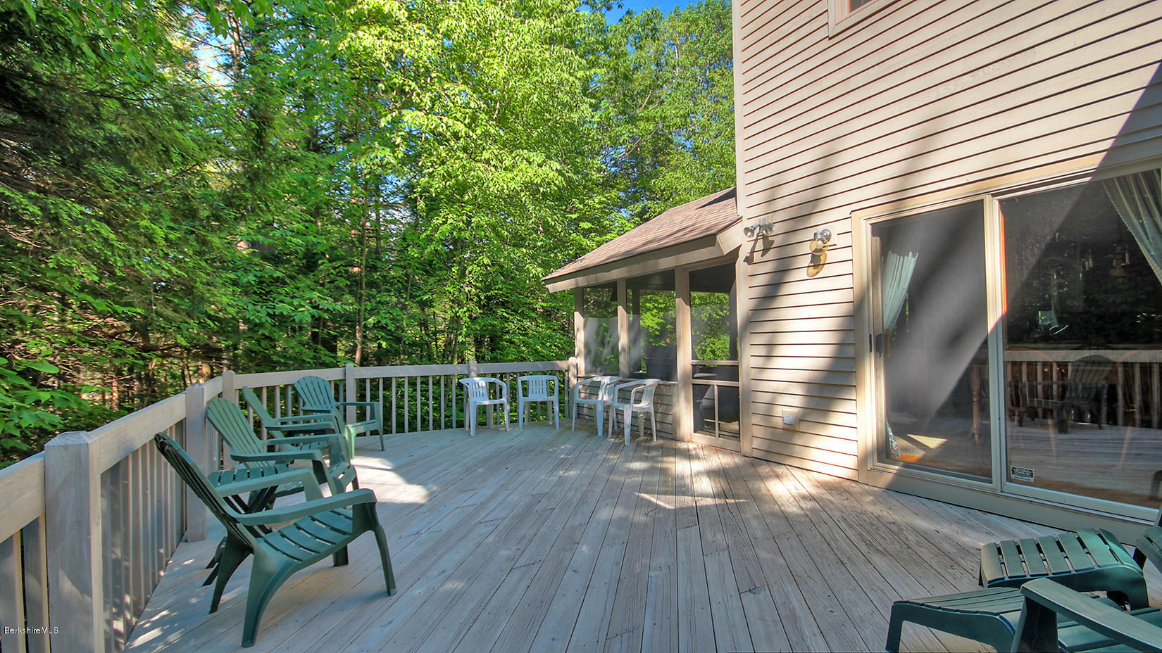 33 Sioux Road Becket, MA 01223 - Photo 29 of 33 a balcony with wooden floor table and chairs