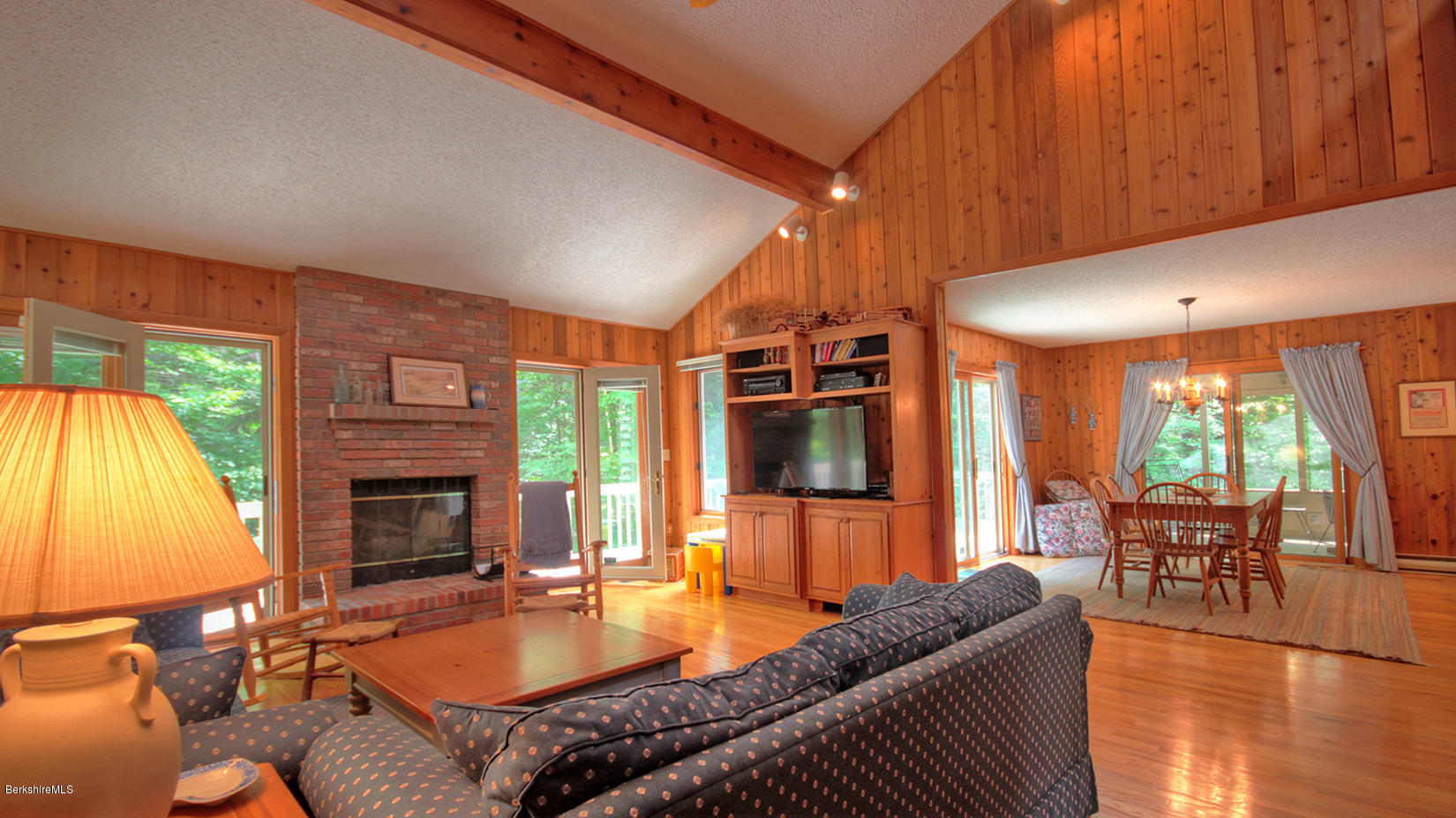 33 Sioux Road Becket, MA 01223 - Photo 8 of 33 a living room with patio furniture and a fireplace