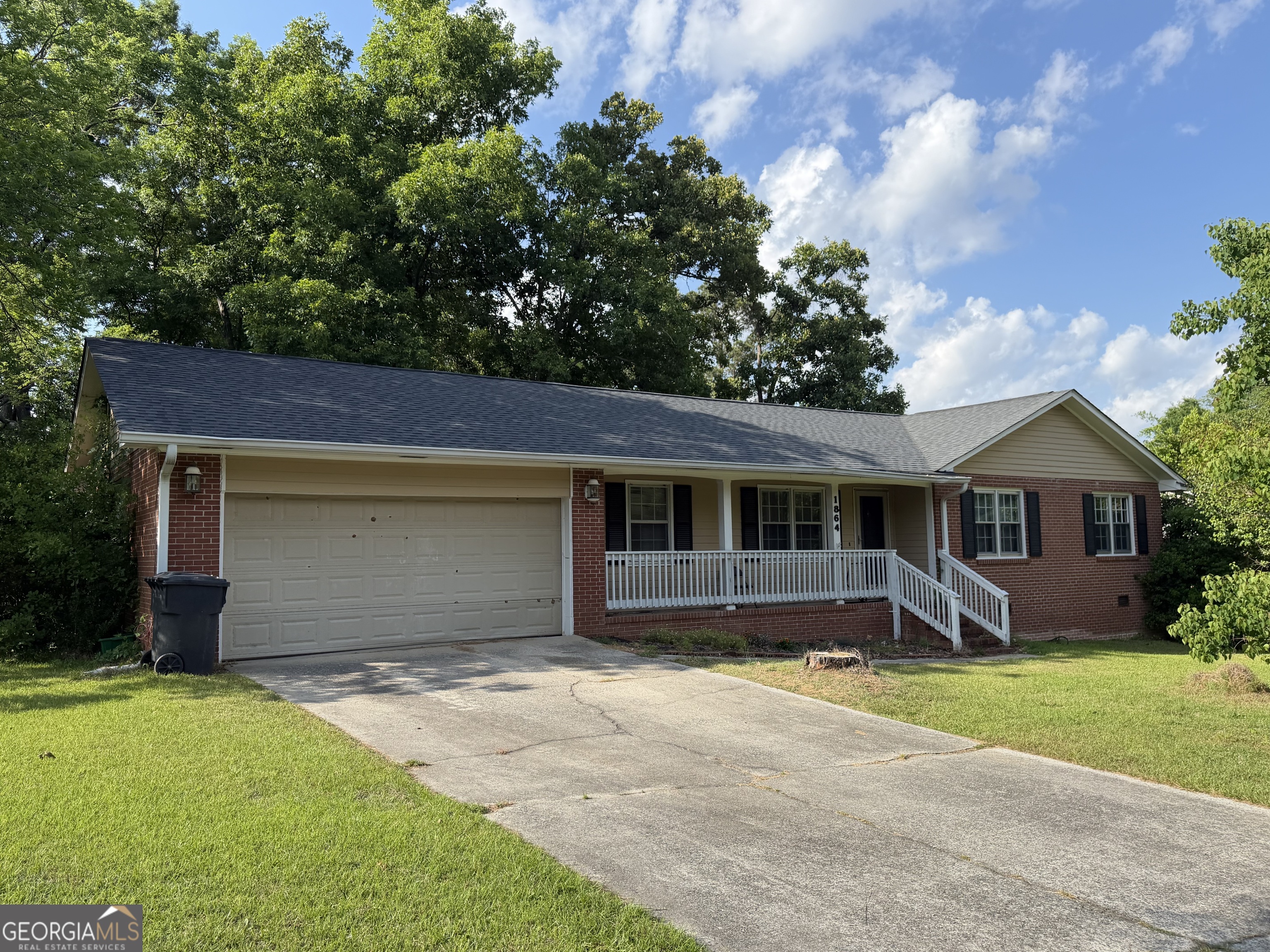 1864 Timberlane Road Milledgeville, GA 31061 - Photo 2 of 2 front view of a house with a yard