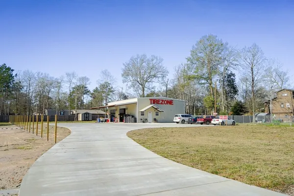 a view of a park with swings and slides