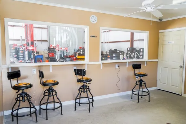 a view of a workspace with furniture