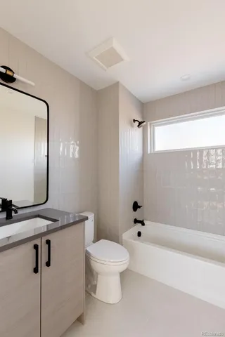 a kitchen with a sink and a window