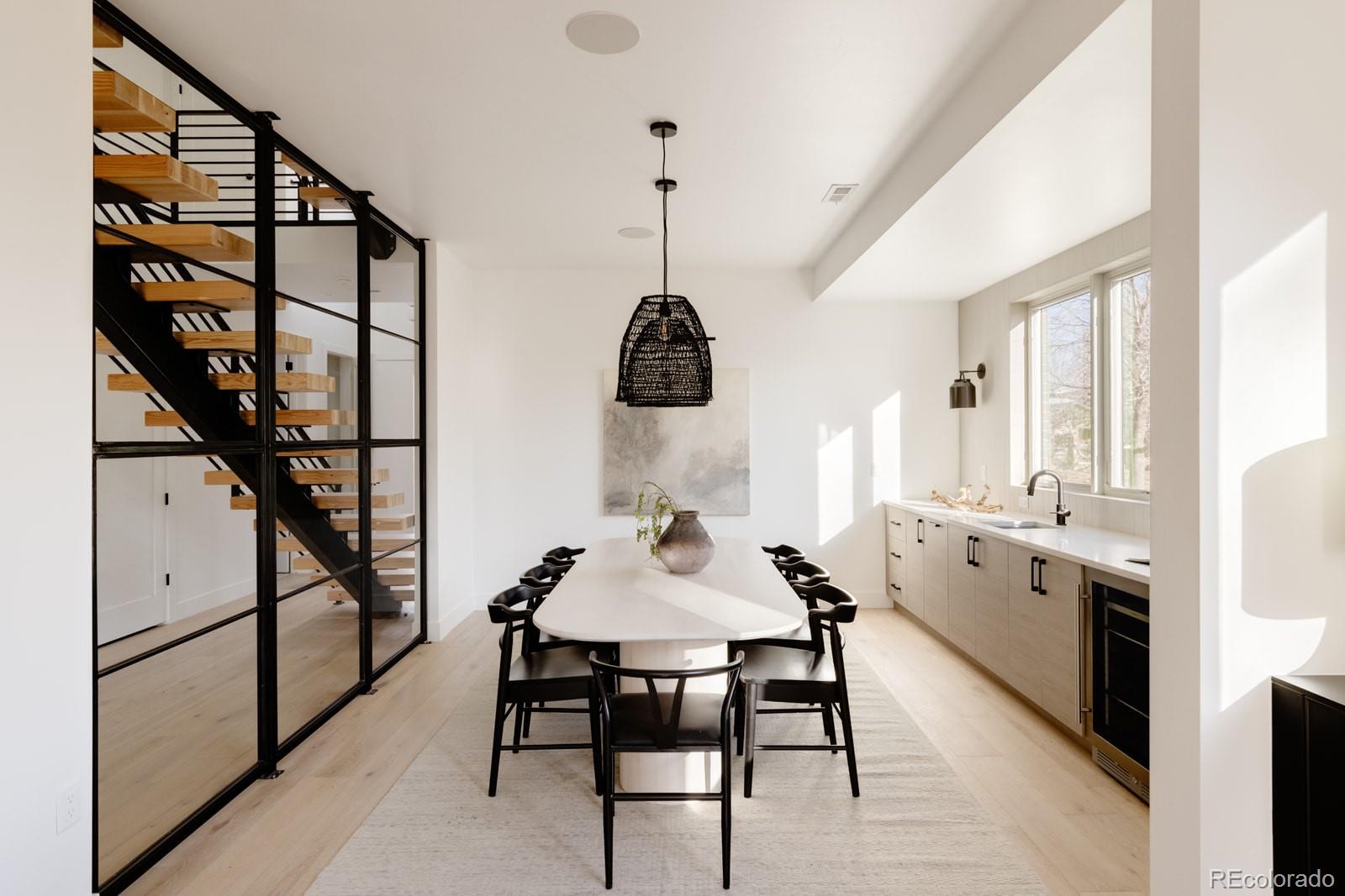 2112 Perry Street Denver, CO 80212 - Photo 10 of 49 a dining room with furniture and window