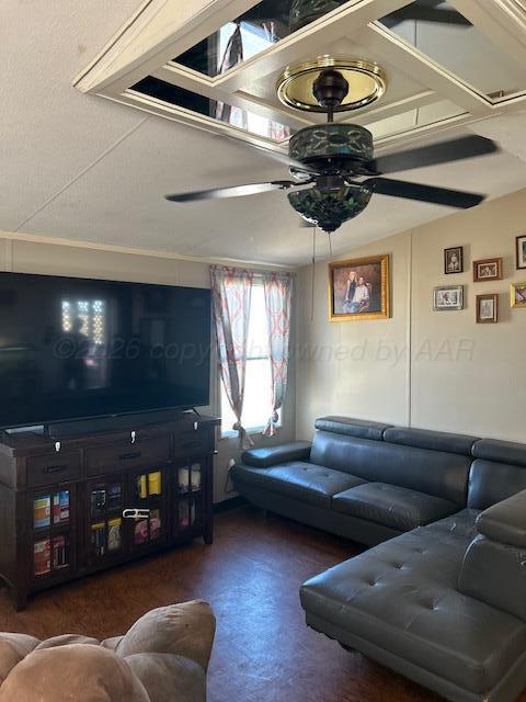 207 North Street Claude, TX 79019 - Photo 2 of 27 a living room with furniture and a flat screen tv