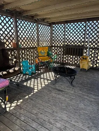 a view of a lawn with chairs