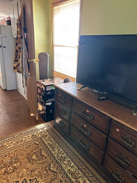 207 North Street Claude, TX 79019 - Photo 4 of 27 a room with furniture and a window