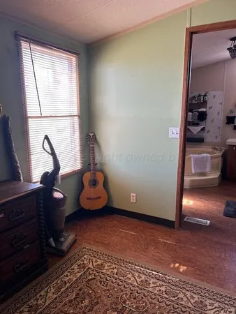 a view of entryway wih livingroom