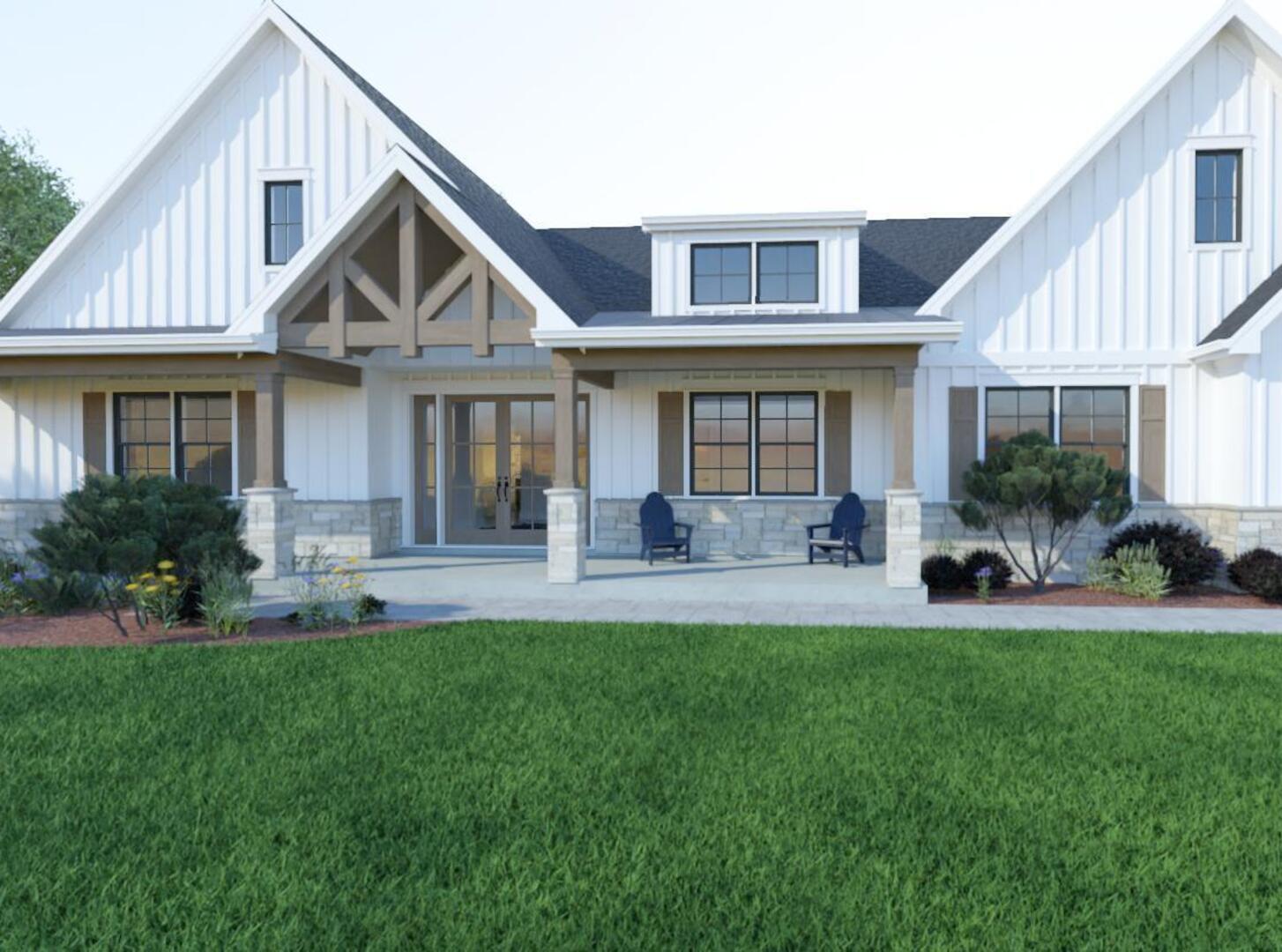 a front view of a house with a yard and porch