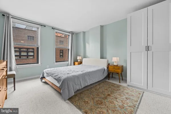 a view of a brick building with a large window