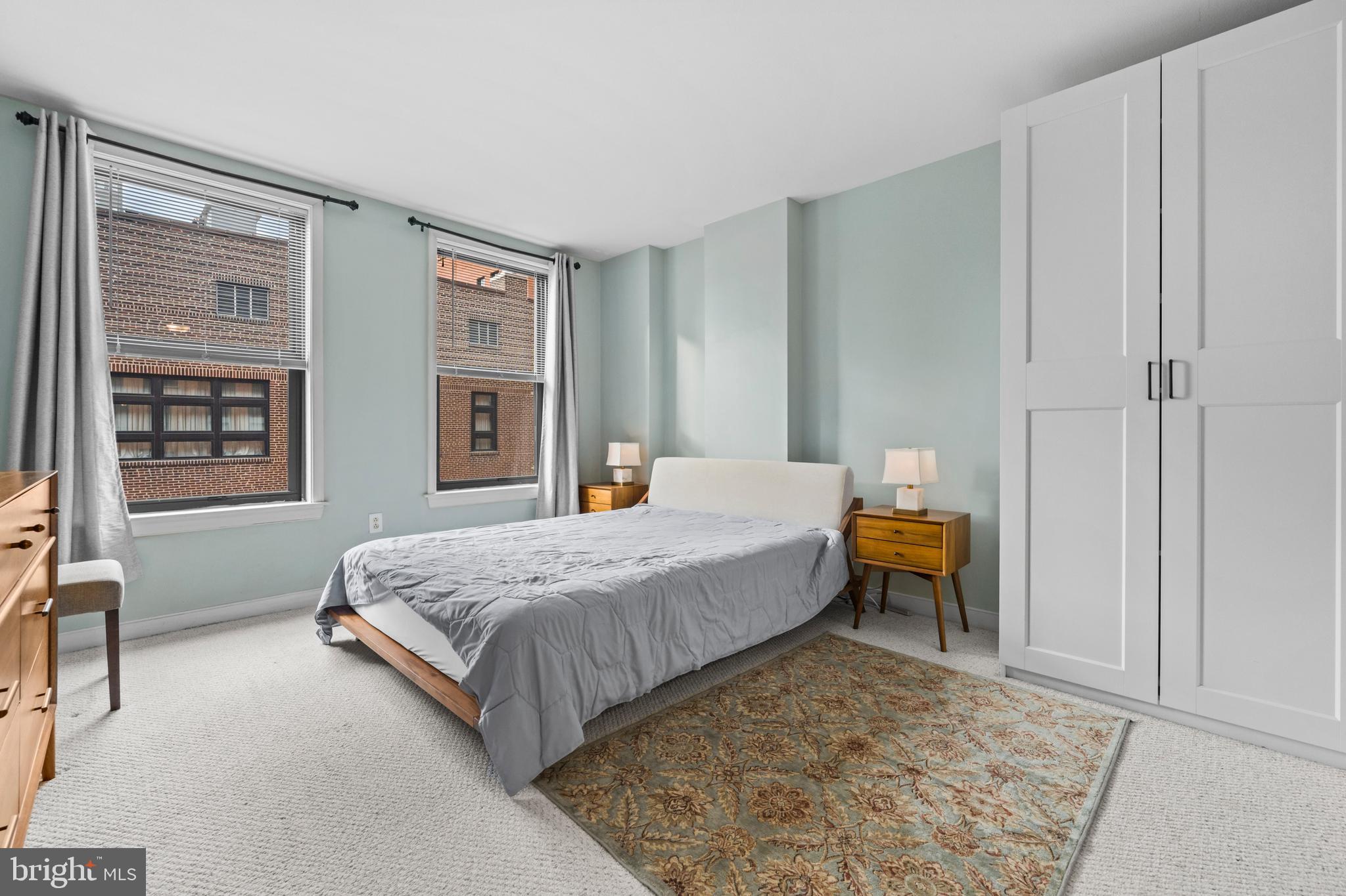 631 D Street Northwest, Unit 845 Washington, DC 20004 - Photo 28 of 84 a living room with a bed furniture and next to a window