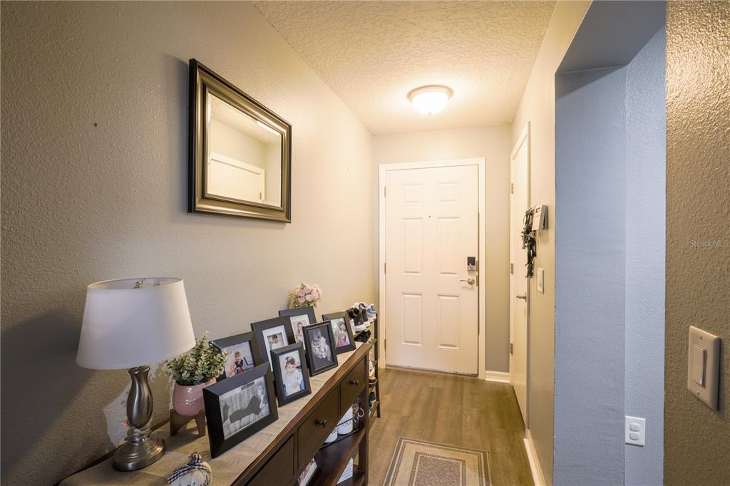 6925 Marble Fawn Place Riverview, FL 33578 - Photo 5 of 21 a view of a hallway with bedroom view