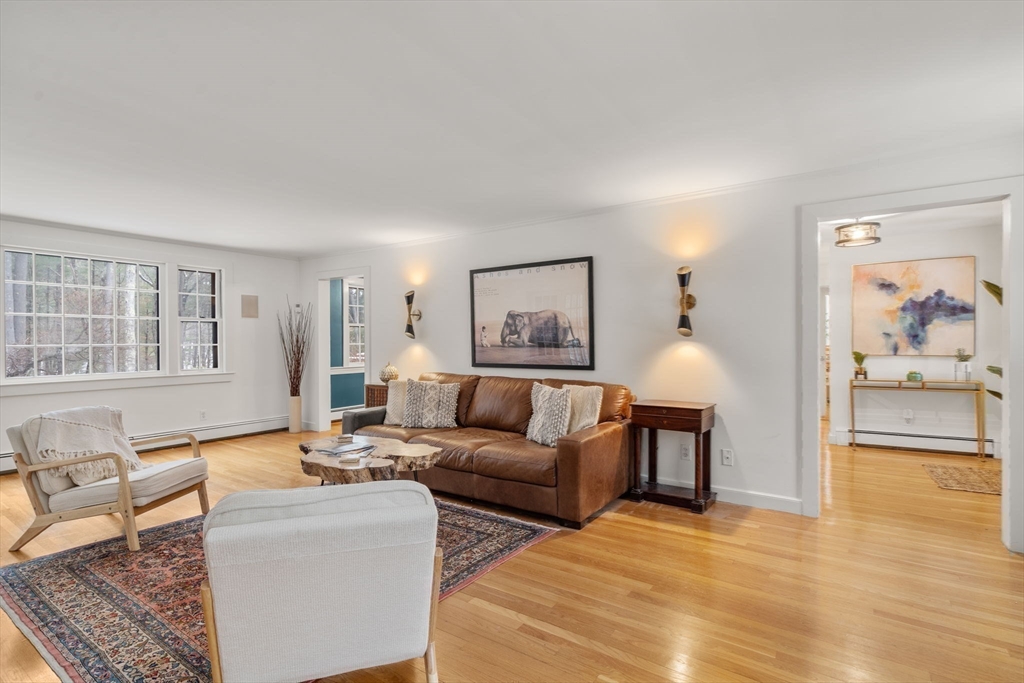 56 Isaac Davis Road Concord, MA 01742 - Photo 14 of 42 a living room with furniture and a window