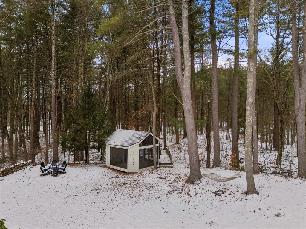 56 Isaac Davis Road Concord, MA 01742 - Photo 33 of 42 a view of a house with a yard