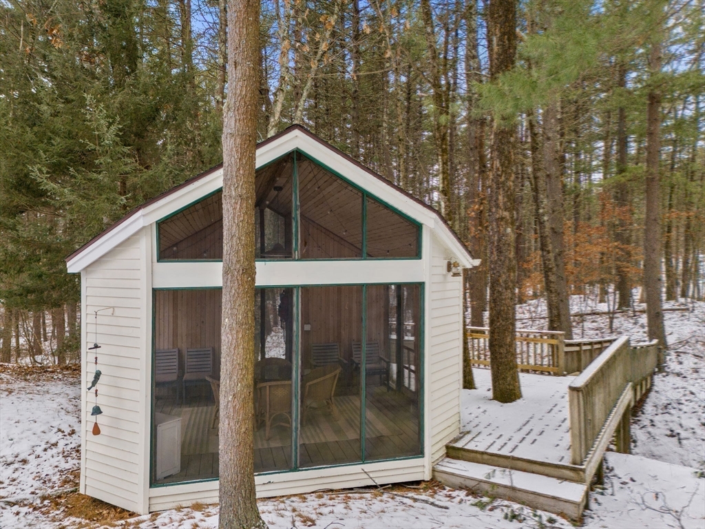 56 Isaac Davis Road Concord, MA 01742 - Photo 34 of 42 a view of a house with a yard