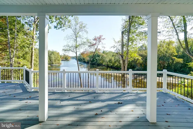 a balcony with wooden floor